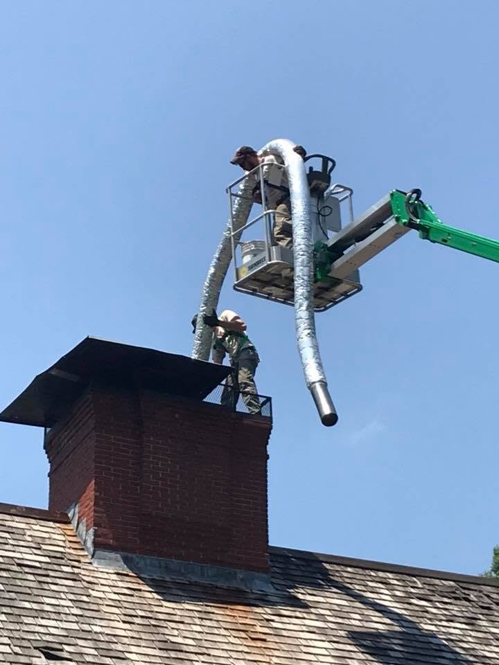 Fireside Sweeps inspecting a chimney